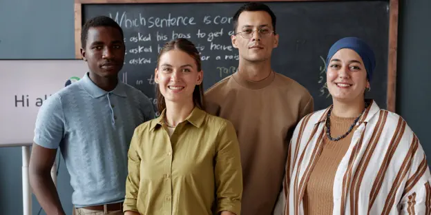 a group of professionals smiling together