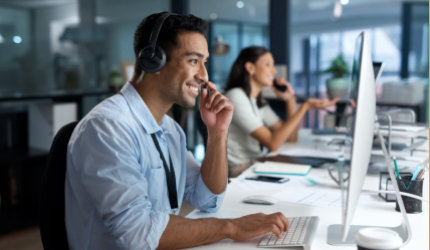 man smiling while working
